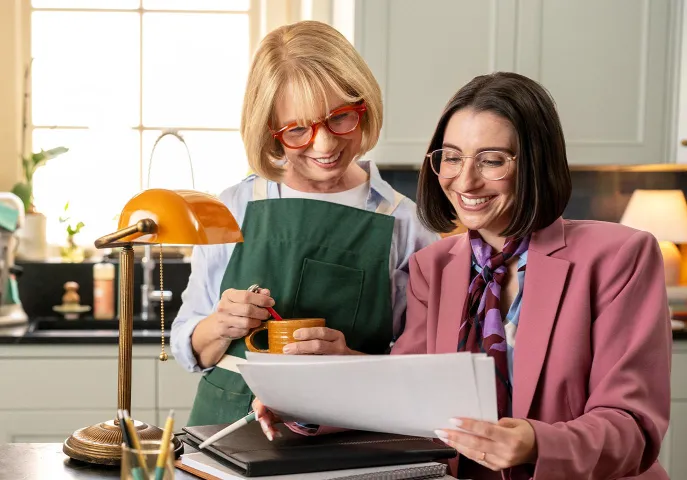 Female advisor helping her elderly client